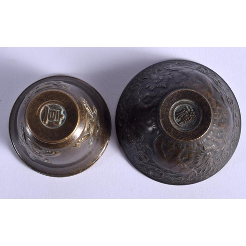 1798 - TWO CHINESE BRONZE TEABOWLS 20th Century. Largest 5.5 cm diameter. (2)