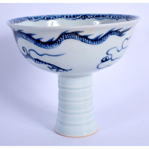 1799 - A CHINESE BLUE AND WHITE PORCELAIN STEM CUP 20th Century, painted with dragons. 10 cm high.