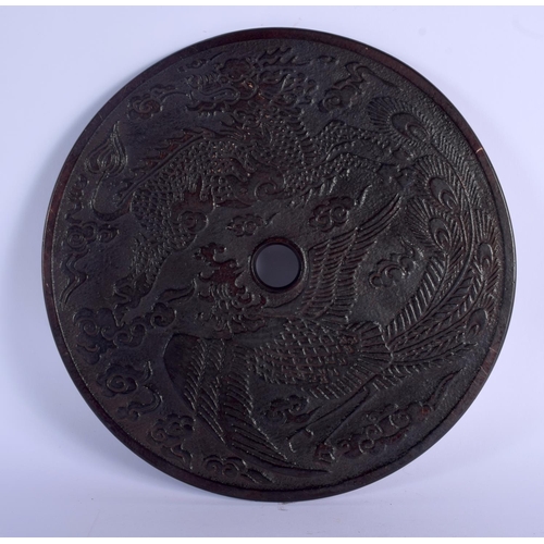 1806 - A LARGE CHINESE CARVED JADE BI DISC 20th Century. 27 cm diameter.