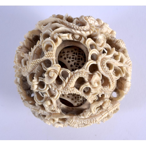 1807 - A 19TH CENTURY CHINESE CANTON CARVED IVORY PUZZLE Qing. 6.5 cm wide.