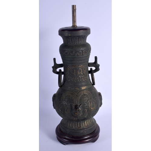 1826 - A 1960S CHINESE TWIN HANDLED ARCHAIC STYLE BRONZE VASE converted to a lamp. Bronze 40 cm x 20 cm.