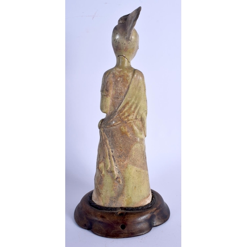 1830 - AN EARLY CHINESE HAN/TANG DYNASTY POTTERY FIGURE OF A FEMALE modelled standing. 30 cm high.