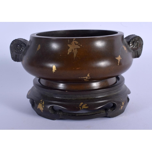 1842 - A CHINESE TWIN HANDLED BRONZE CENSER ON STAND 20th Century, decorated with gold splash. 14 cm wide, ... 