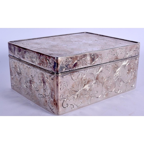 1843 - AN EARLY 20TH CENTURY JAPANESE MEIJI PERIOD SILVER BOX AND COVER decorated with foliage and vines. 6... 