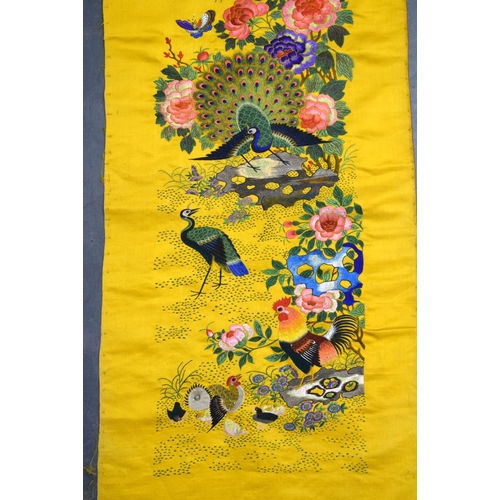 1849 - A LONG 19TH CENTURY CHINESE YELLOW SILK EMBROIDERED PANEL Qing, decorated with hundreds of birds wit... 