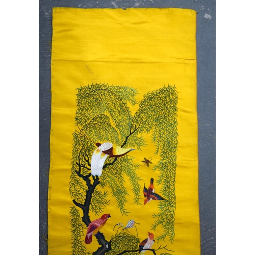 1849 - A LONG 19TH CENTURY CHINESE YELLOW SILK EMBROIDERED PANEL Qing, decorated with hundreds of birds wit... 