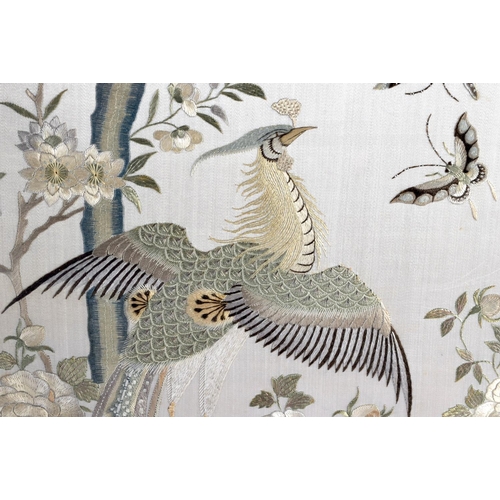 1853 - A LARGE 19TH CENTURY CHINESE FRAMED SILKWORK EMBROIDERED SCREEN Qing, decorated with birds in variou... 