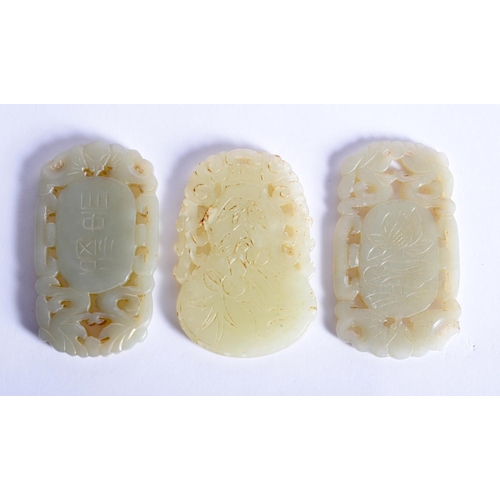 1861 - THREE CHINESE CARVED JADE PLAQUE PENDANTS 20th Century, in various forms and sizes. Largest 5 cm x 5... 