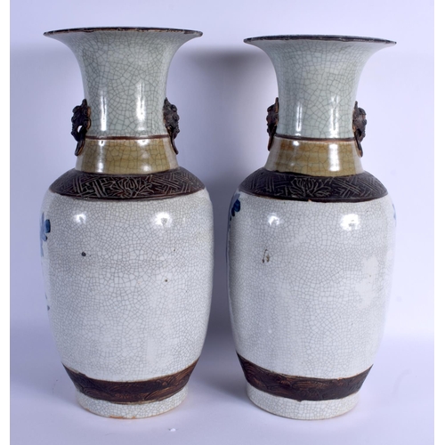 1883 - A LARGE PAIR OF 19TH CENTURY CHINESE BLUE AND WHITE CRACKLE GLAZED VASES Late Qing, painted with bir... 