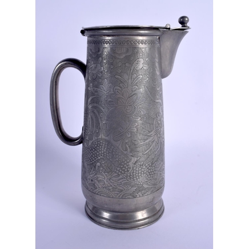 1884 - AN EARLY 20TH CENTURY CHINESE PEWTER KUTHING JUG decorated with dragons. 21 cm high.