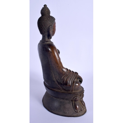 1897 - A CHINESE TIBETAN BRONZE FIGURE OF A SEATED BUDDHA 20th Century. 30 cm x 14 cm.