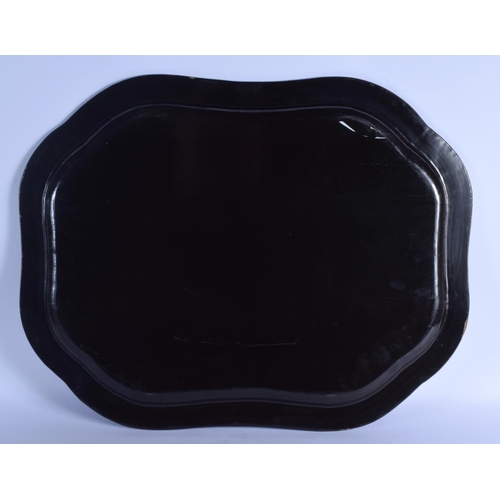 1918 - AN EARLY 19TH CENTURY CHINESE EXPORT BLACK LACQUER TRAY Qing, painted with landscapes and floral spr... 