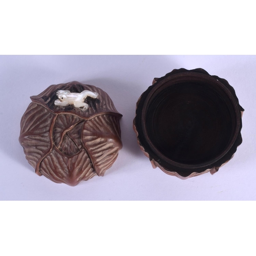 1940 - A JAPANESE CARVED WOOD BOX AND MOTHER OF PEARL BOX. 5.5 cm x 6 cm,