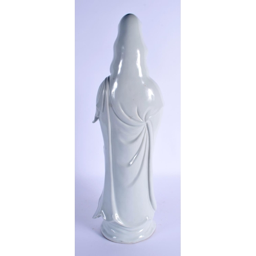 1950 - A 19TH CENTURY CHINESE BLANC DE CHINE PORCELAIN FIGURE OF GUANYIN Qing. 51 cm high.