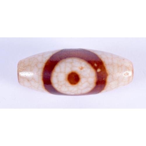 1963 - A CHINESE TIBETAN AGATE BEAD 20th Century. 4.5 cm long.