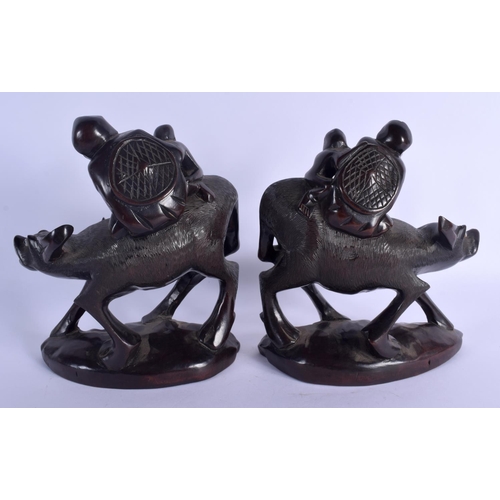 1973 - A PAIR OF 19TH CENTURY CHINESE CARVED ROOTWOOD BUFFALO Late Qing. 20 cm x 24 cm.