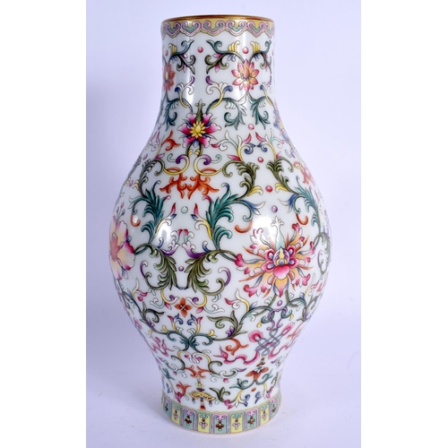 2003 - AN EARLY 20TH CENTURY CHINESE FAMILLE ROSE PORCELAIN BALUSTER VASE Late Qing/Republic, bearing Qianl... 