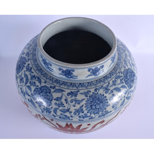 2028 - A VERY LARGE CHINESE QING DYNASTY BLUE AND WHITE VASE Ming style, painted with red ducks and extensi... 