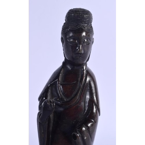 2037 - AN 18TH/19TH CENTURY CHINESE BRONZE FIGURE OF GUANYIN modelled in flowing robes. Bronze 14 cm high.