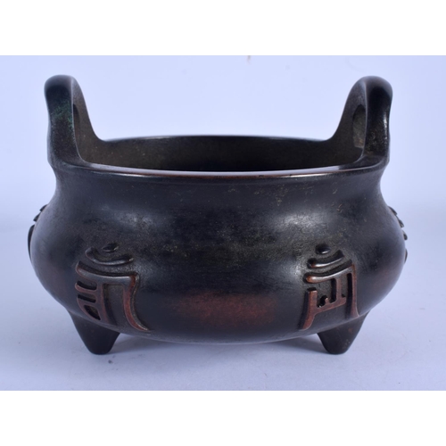 2041 - A CHINESE TWIN HANDLED BRONZE TWIN HANDLED CENSER 20th Century, bearing Xuande marks to base. 14 cm ... 