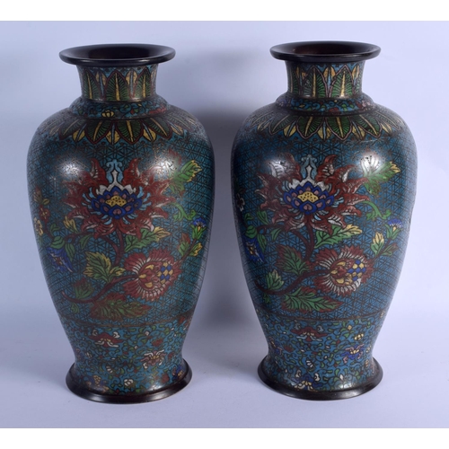 2042 - A LARGE PAIR OF 19TH CENTURY CHINESE CHAMPLEVE ENAMEL VASES decorated with flowers and vines. 39 cm ... 