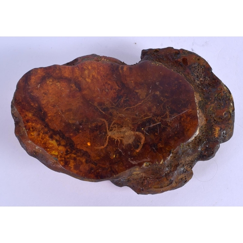 2061 - AN EARLY 20TH CENTURY CHINESE CARVED AMBER SCHOLARS BOULDER Late Qing/Republic. 432 grams. 15 cm x 9... 