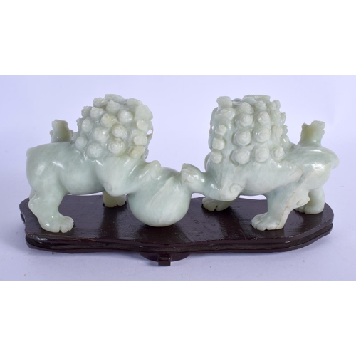 2063 - AN EARLY 20TH CENTURY CHINESE CARVED SOAPSTONE FIGURE OF BUDDHISTIC LIONS Late Qing/Republic. Figure... 