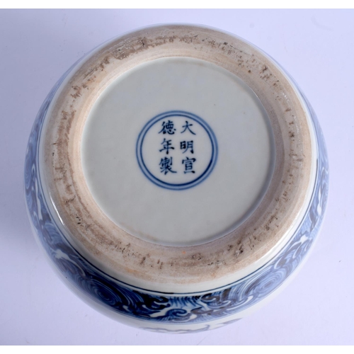 2065 - A CHINESE BLUE AND WHITE PORCELAIN JARDINIERE 20th Century, bearing Xuande marks to base, painted wi... 