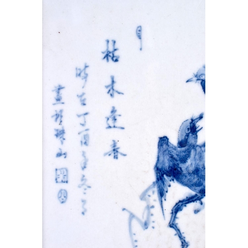 2072 - A CHINESE BLUE AND WHITE PORCELAIN PLAQUE 20th Century, painted with birds and calligraphy. Porcelai... 