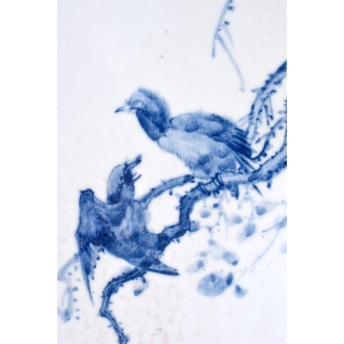 2072 - A CHINESE BLUE AND WHITE PORCELAIN PLAQUE 20th Century, painted with birds and calligraphy. Porcelai... 