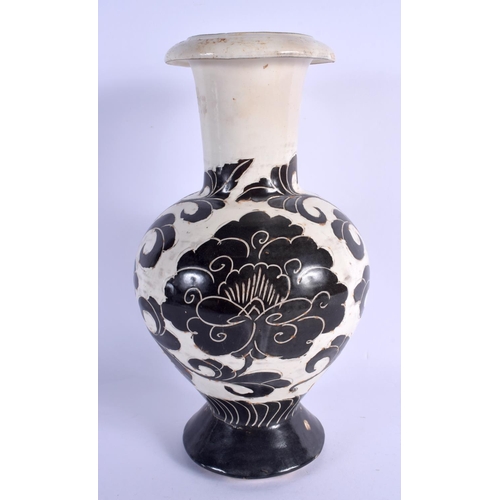 2082 - A 19TH CENTURY CHINESE CHIZOU POTTERY BALUSTER VASE decorated with brown foliage. 33 cm high.