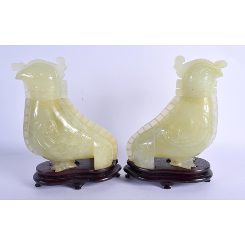 2088 - AN EARLY 20TH CENTURY CHINESE JADE ARCHAIC VASES AND COVERS Late Qing/Republic, carved with wings. J... 