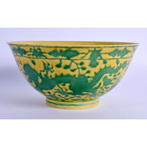 2090 - A CHINESE QING DYNASTY YELLOW GLAZED PORCELAIN DRAGON BOWL Qianlong mark and possibly of the period,... 