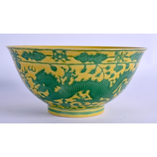 2090 - A CHINESE QING DYNASTY YELLOW GLAZED PORCELAIN DRAGON BOWL Qianlong mark and possibly of the period,... 