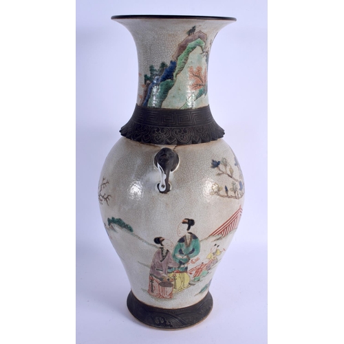 2094 - A LARGE CHINESE TWIN HANDLED CRACKLE GLAZED VASE 20th Century, bearing Kangxi marks to base. 46 cm x... 