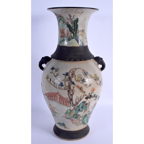 2094 - A LARGE CHINESE TWIN HANDLED CRACKLE GLAZED VASE 20th Century, bearing Kangxi marks to base. 46 cm x... 