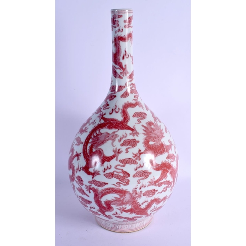 2095 - A LARGE CHINESE IRON RED GLAZED PORCELAIN BULBOUS VASE 20th Century, bearing Qianlong marks to base,... 