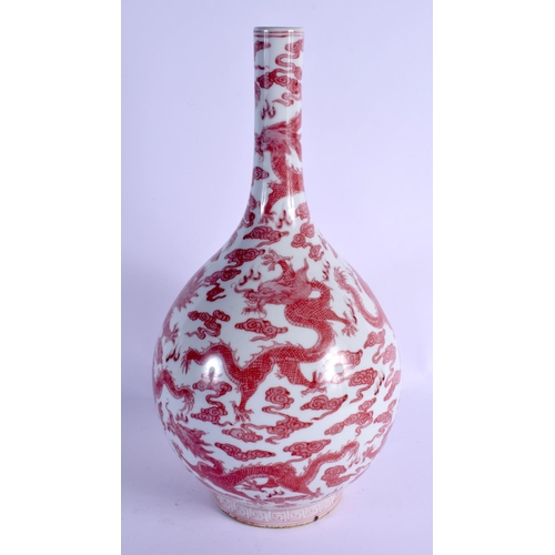 2095 - A LARGE CHINESE IRON RED GLAZED PORCELAIN BULBOUS VASE 20th Century, bearing Qianlong marks to base,... 