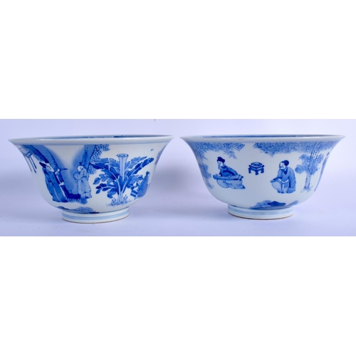 2103 - A PAIR OF CHINESE BLUE AND WHITE PORCELAIN BOWLS 20th Century, Kangxi style, painted with figures wi... 