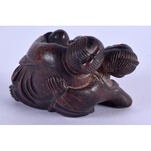 2130 - A JAPANESE CARVED BOXWOOD EROTIC NETSUKE. 6 cm x 4 cm.