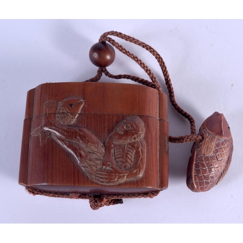 2135 - A JAPANESE CARVED BOXWOOD INRO AND COVER decorated with fish. 7 cm x 5 cm.