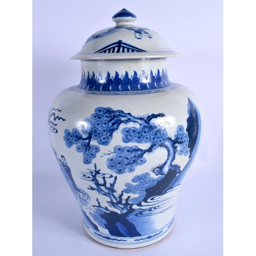 2147 - A LARGE 19TH CENTURY CHINESE BLUE AND WHITE PORCELAIN VASE AND COVER Kangxi style, painted with figu... 