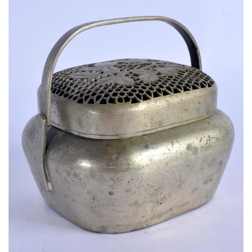 2152 - A 19TH CENTURY CHINESE PAKTONG HAND WARMER AND COVER Late Qing. 8 cm wide.