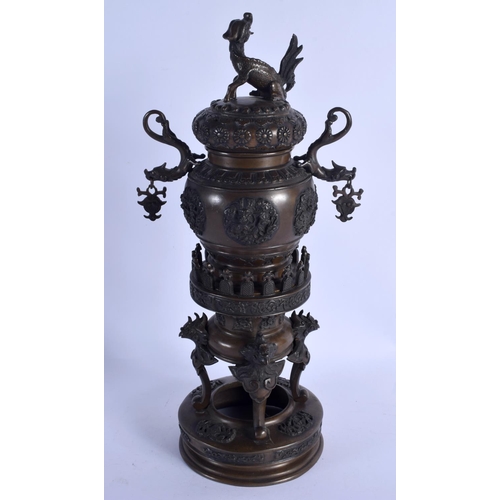 2153 - A 19TH CENTURY JAPANESE MEIJI PERIOD BRONZE CENSER AND COVER decorated with figures. 44 cm x 16 cm.