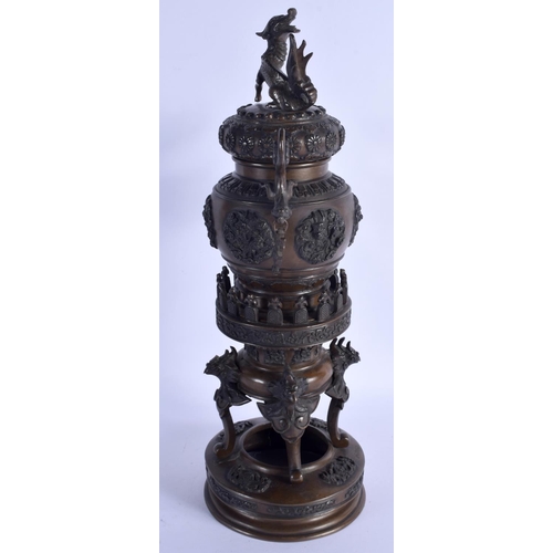 2153 - A 19TH CENTURY JAPANESE MEIJI PERIOD BRONZE CENSER AND COVER decorated with figures. 44 cm x 16 cm.