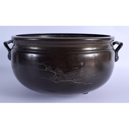 2154 - A 19TH CENTURY JAPANESE MEIJI PERIOD TWIN HANDLED BRONZE JARDINIERE decorated with landscapes. 37 cm... 