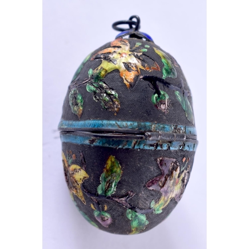 2158 - AN EARLY 20TH CENTURY CHINESE SILVER AND ENAMEL EGG LOCKET. 3.5 cm high.