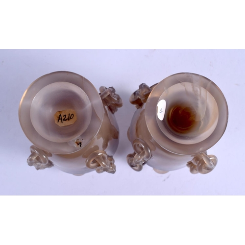 2164 - A PAIR OF EARLY 20TH CENTURY CHINESE CARVED AGATE VASES AND COVERS Late Qing/Republic, decorated wit... 