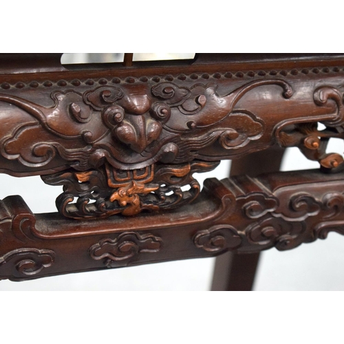 2171 - A FINE 19TH CENTURY CHINESE CARVED HONGMU HARDWOOD TABLE Qing, carved with mask heads and extensive ... 