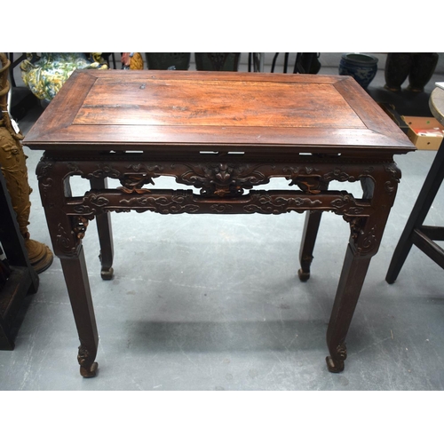 2171 - A FINE 19TH CENTURY CHINESE CARVED HONGMU HARDWOOD TABLE Qing, carved with mask heads and extensive ... 